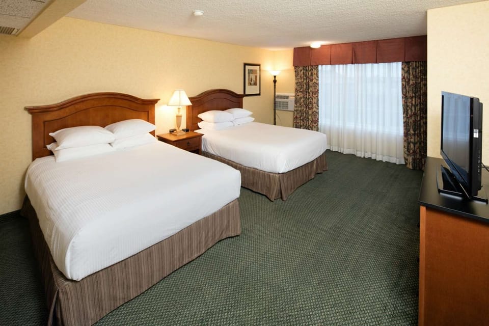 Stretch out in a bright double-queen room with extra floor space.