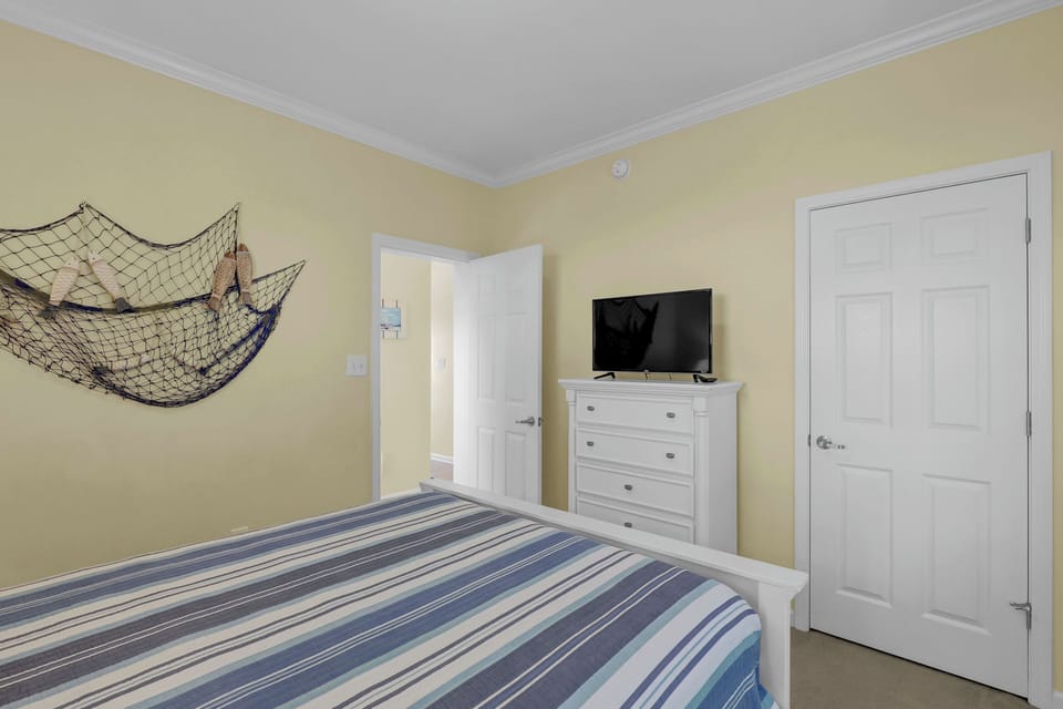 Lower Guest Bedroom with Queen Bed & New Mattress.
