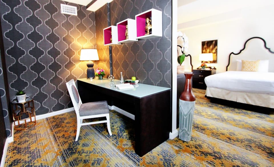 Get productive at the chic desk under warm lamplight.