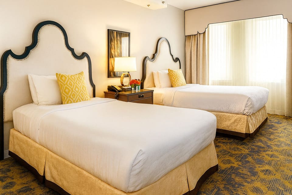 Unwind in crisp linens with two plush queen beds.
