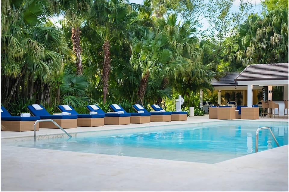 Lounge poolside in serene tropical privacy all afternoon.