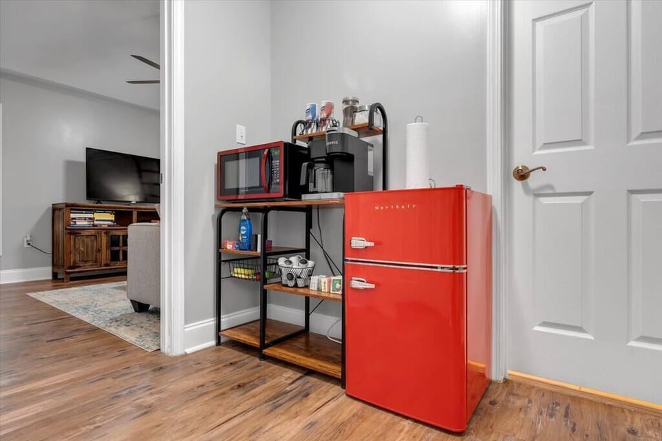 Kitchenette with fridge, microwave, toaster oven, Keurig and drip coffee maker