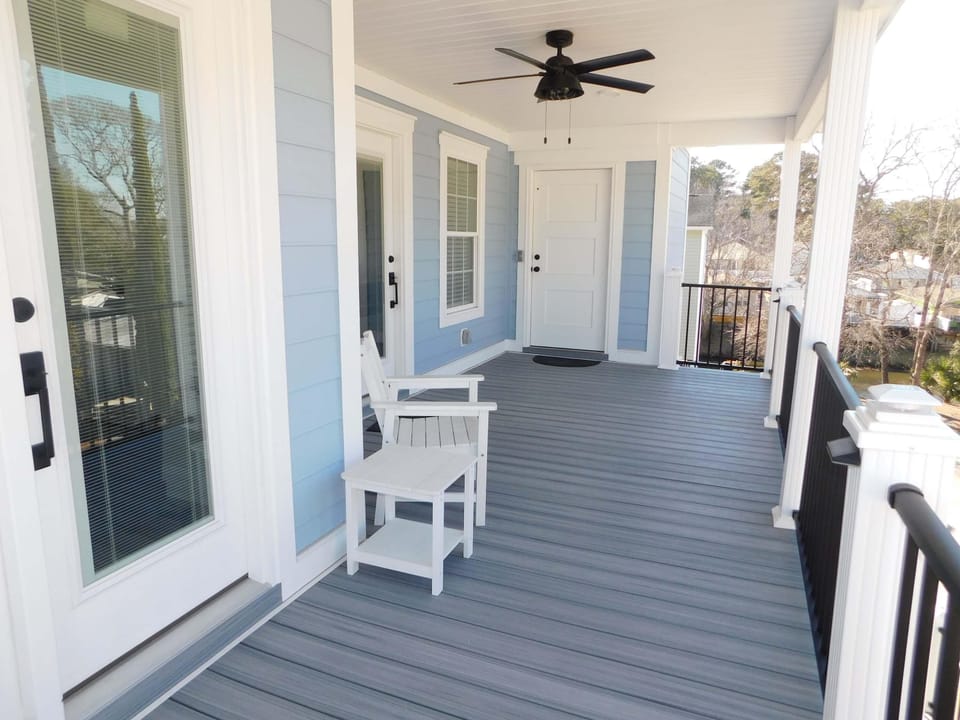Spacious front porch with rocking chairs for peaceful mornings