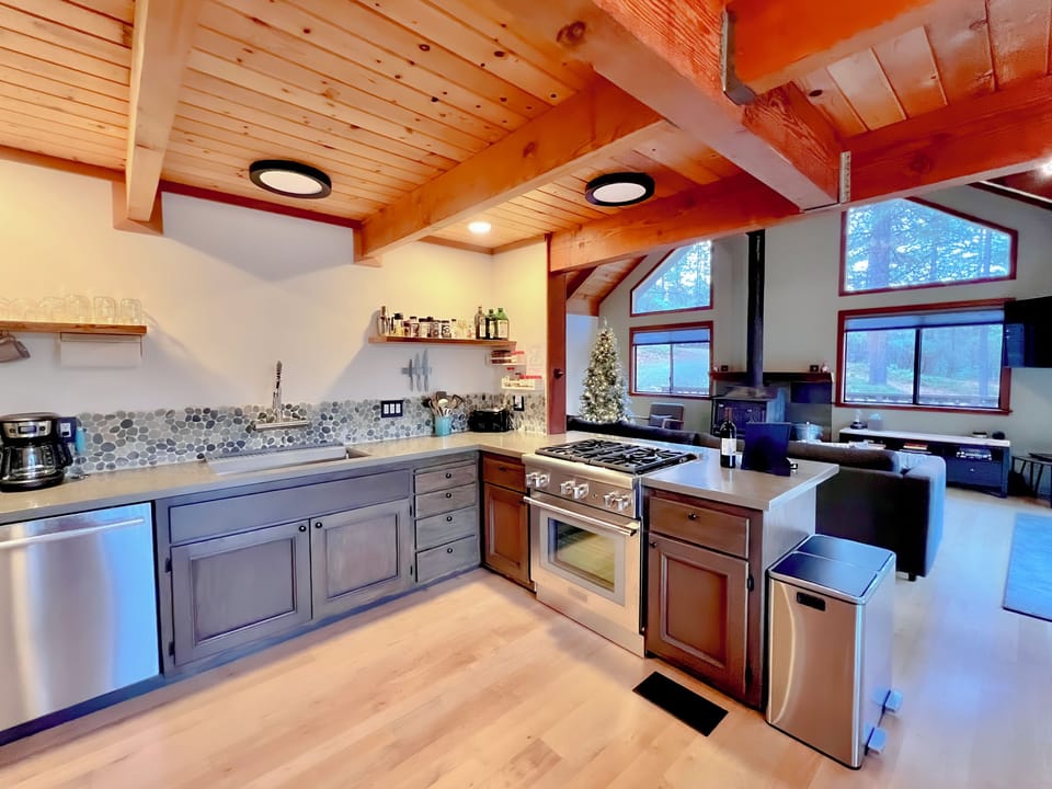 Fully stocked kitchen with high-end appliances and conveniences