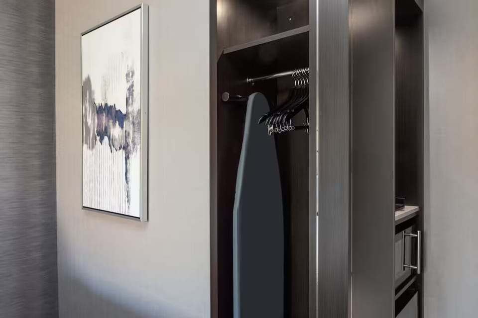 Unpack effortlessly with a sleek closet and in-room ironing.