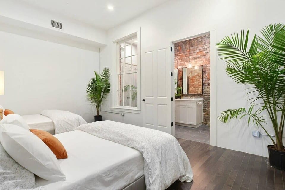 Unit B | Bedroom 4 | Two Full Beds | First Floor | Ensuite Bathroom | Rear of Unit