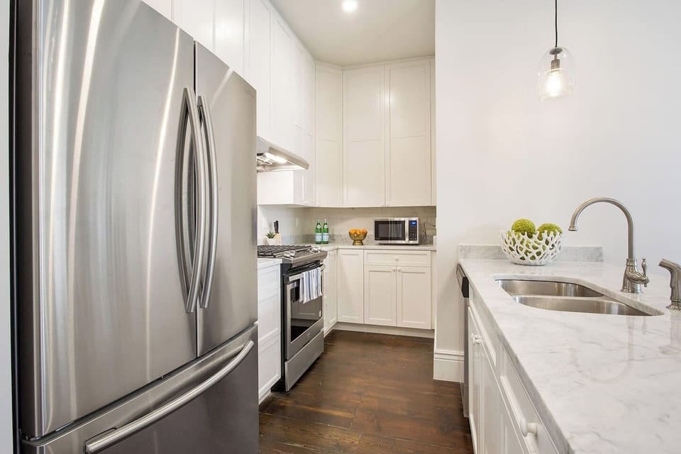 Unit A | Kitchen | Single Level Unit | Open to Dining and Living Areas