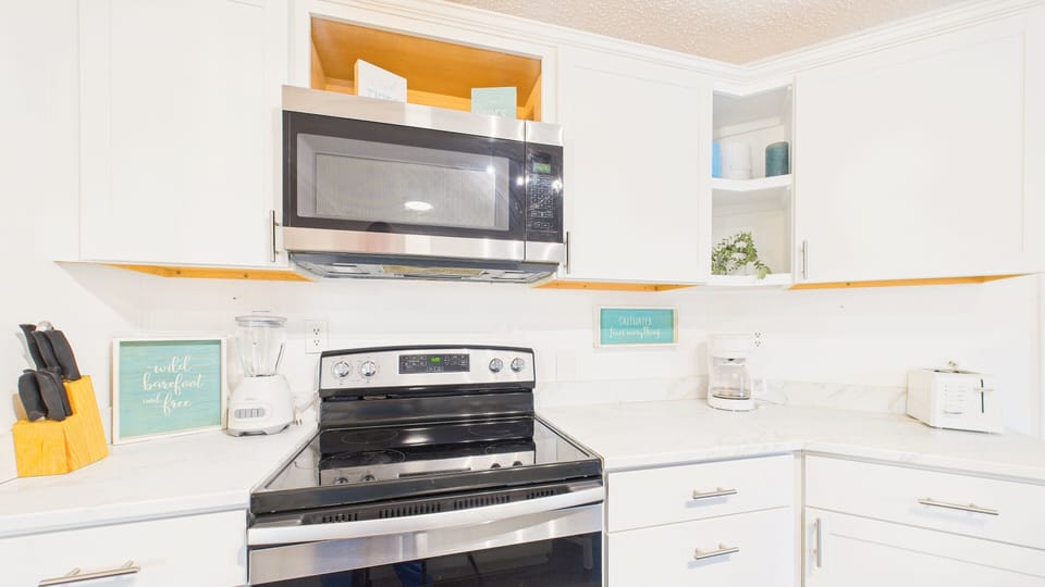 Fully applianced kitchen with all the cooking essentials and space for meals