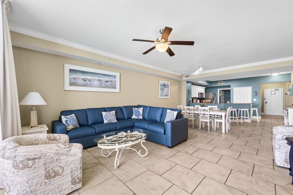 Coastal living and dining area with beach-inspired décor and spacious layout