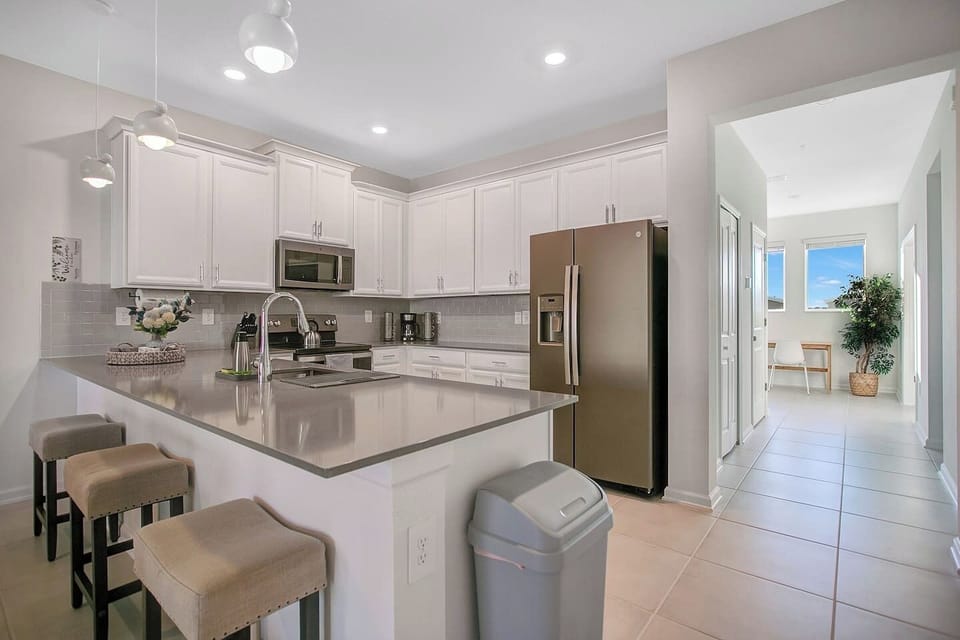 Kitchen, and hallway spaces. At the end is the desk.