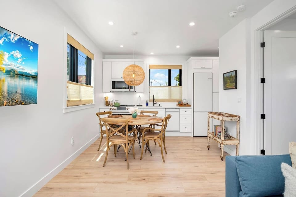 Clean, open dining area that blends seamlessly into the living and kitchen spaces