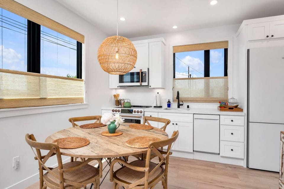 Clean, open dining area that blends seamlessly into the living and kitchen spaces