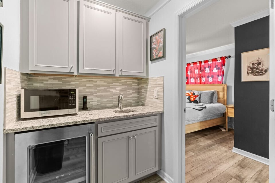 Kitchenette with microwave and sink