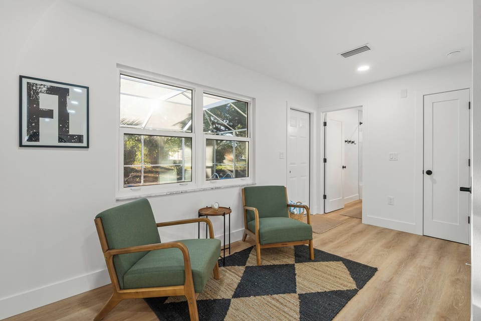 Enjoy views of the pool from this sitting area!