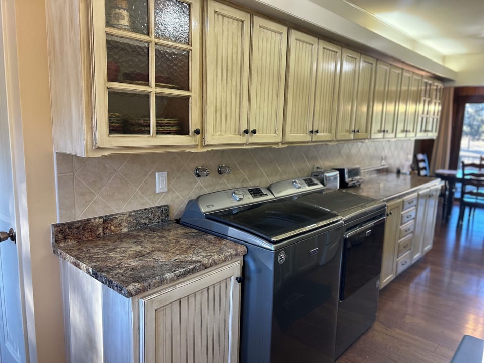 Washer and dryer in kitchen