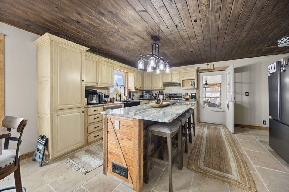 The kitchen is bright, functional, and ready for shared meals and easy mornings.