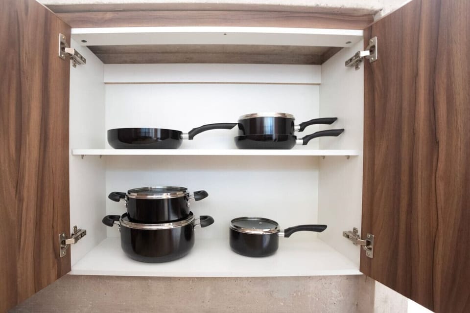 Enjoy the convenience of having pots, pans, and kitchen essentials ready for home-cooked meals.