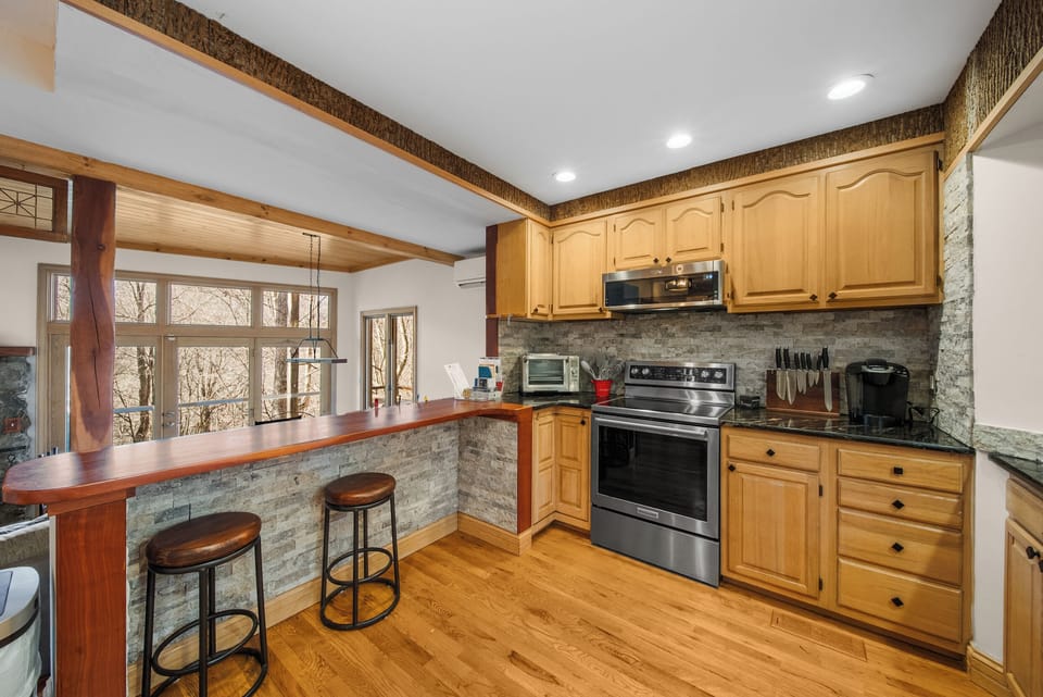 Kitchen Seating with a Stone Knee Wall