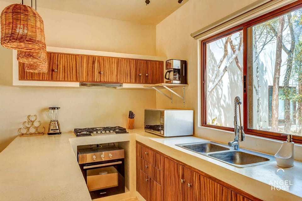 A fully-equipped kitchen for preparing meals in the comfort of home