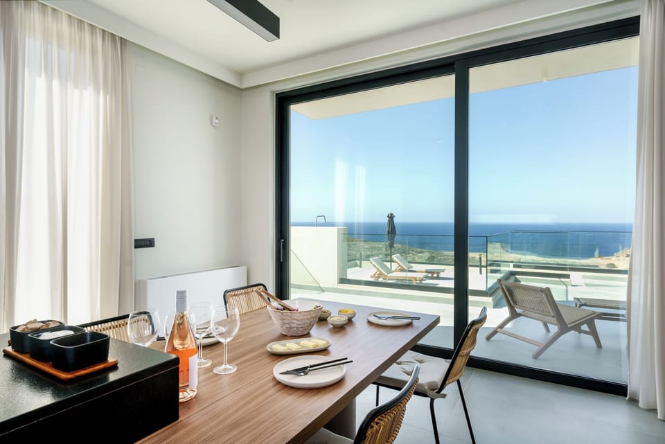 Bright kitchen with all appliances and elegant dining table
