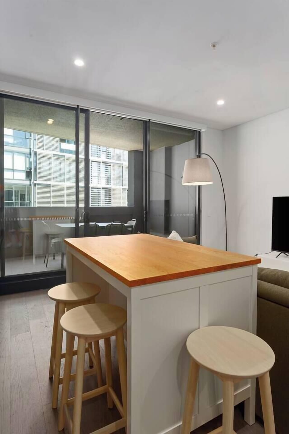 Settle in at the island bench to enjoy breakfast, work remotely, or linger over dinner.