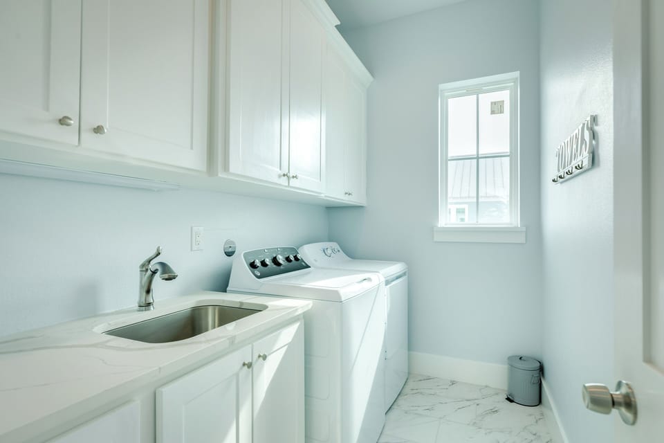 Utility room with full size washer & dryer
