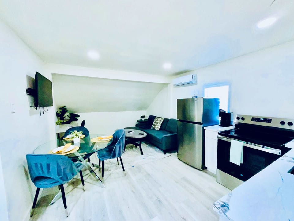 Open concept studio style with full kitchen yet still has a private bedroom.