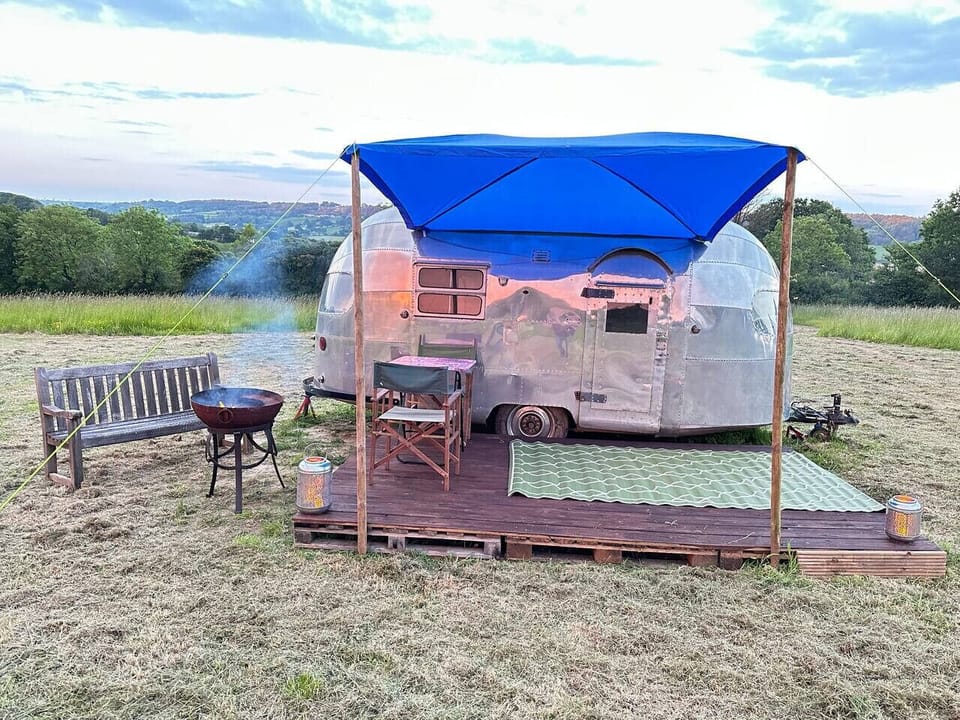 Firepit, deck and canopy set up for unforgettable countryside evenings.