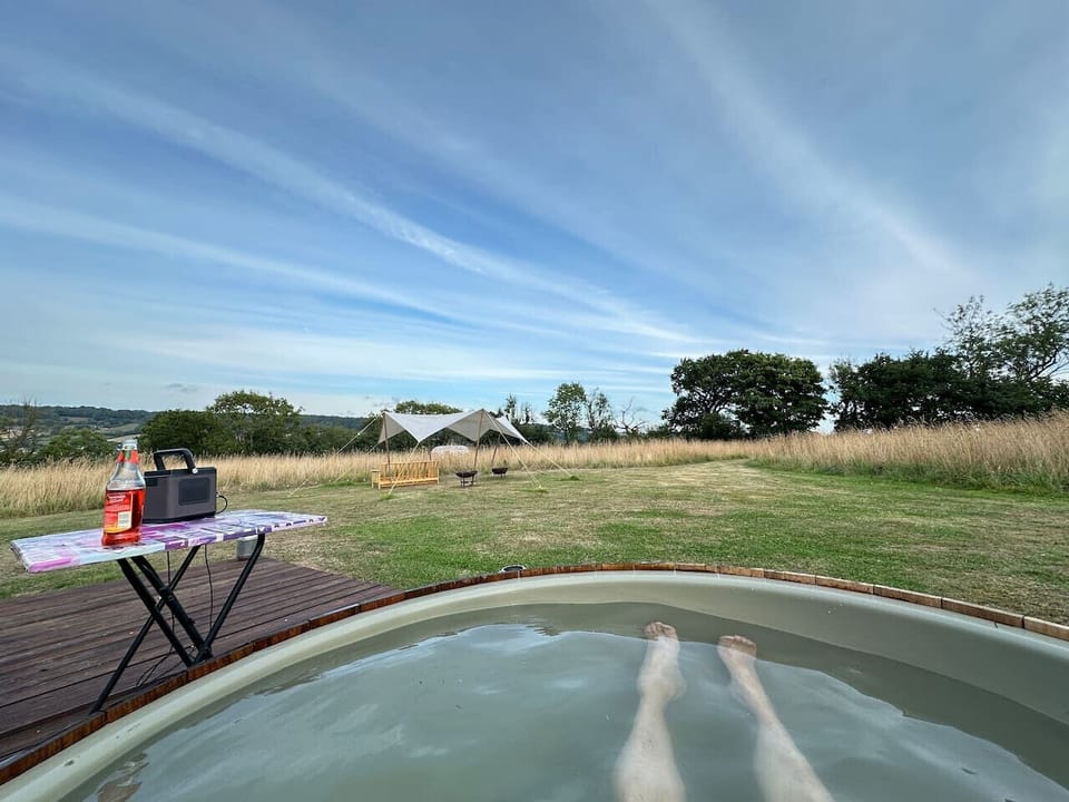Soak in the wood-fired tub beneath wide open skies.