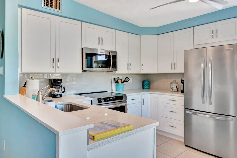 Kitchen | Stainless Steel Appliances | Breakfast Bar Seating