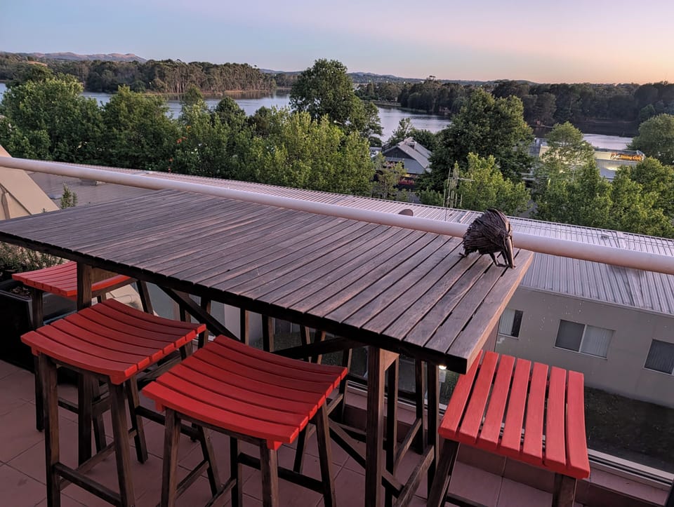 Outdoor dining overlooking Lake Ginninderra