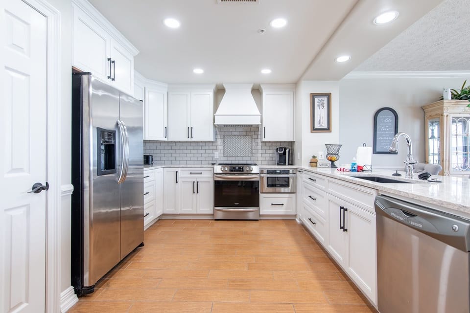 Fully applianced kitchen with stainless appliances, coffee essentials, and all the cooking essentials to elevate your stay