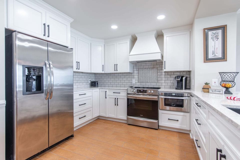 Fully applianced kitchen with stainless appliances, coffee essentials, and all the cooking essentials to elevate your stay