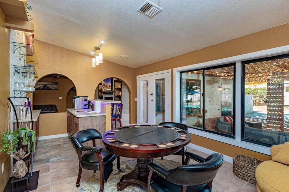 Fun indoor game and bar area with seating—great for game nights and casual hangouts.