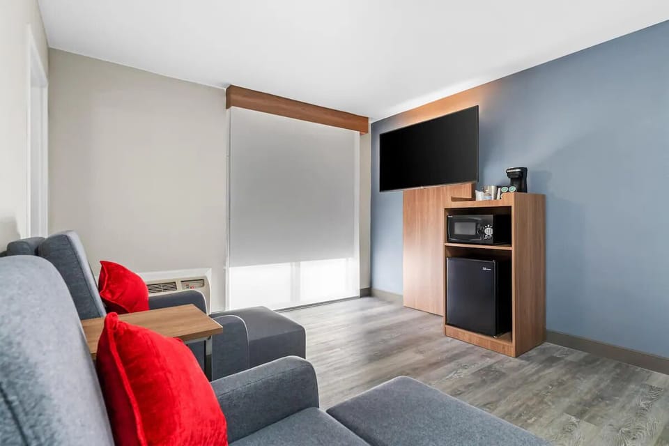 Settle in with TV, microwave, and mini fridge convenience.