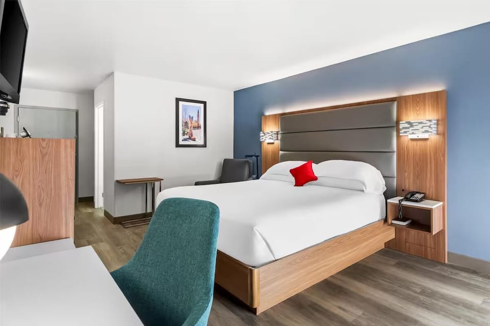 Recharge in a calm, modern room with soft lighting.