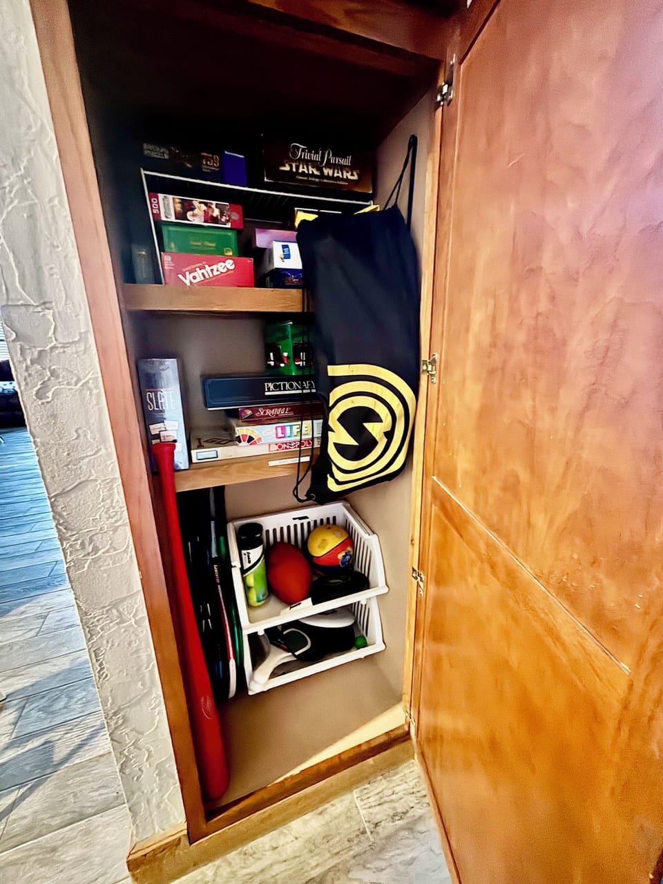 game closet- puzzles, cards, poker, board games, tennis, spikeball, wiffle ball