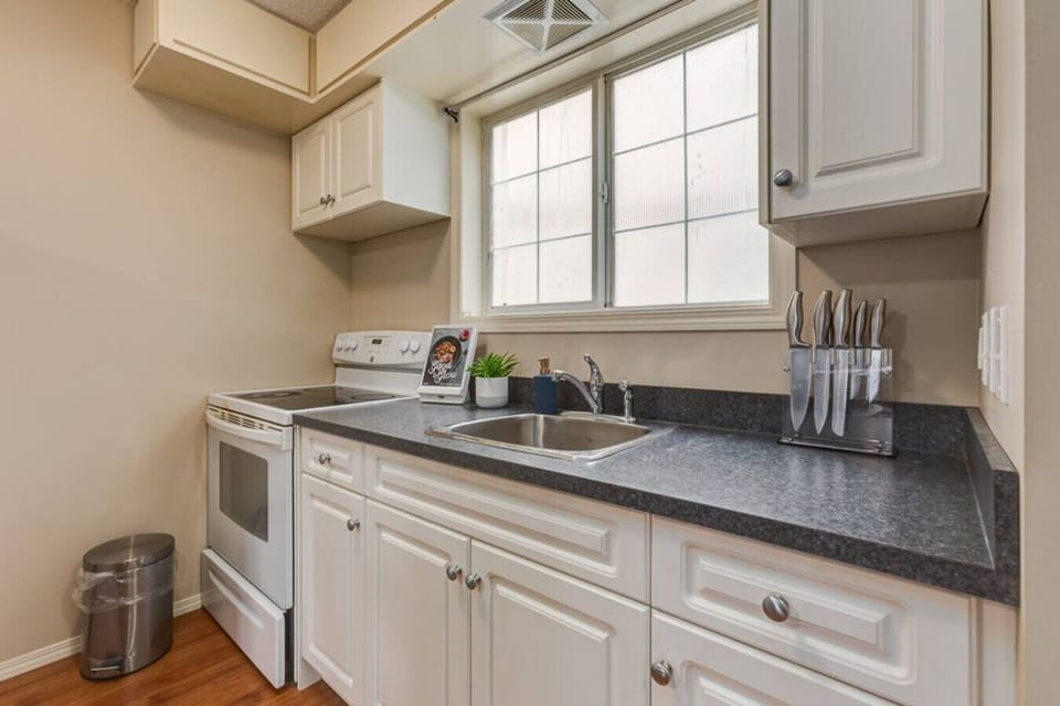 Bright and open, fully stocked kitchen.
