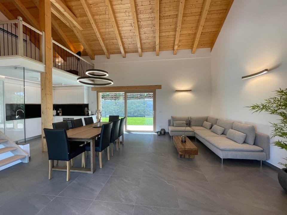 LAVANDA - Open living room with sofa, dining table, open modern fully equipped kitchen