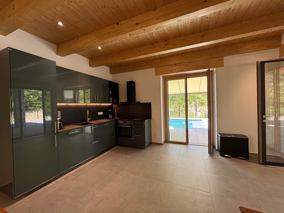 PINI - Kitchen - Door Terrace Pool