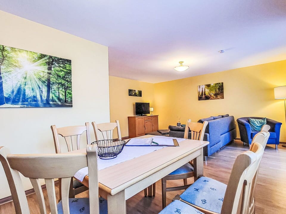 Furniture, Flooring, Living Room, Room, Picture Frame, Wood Flooring, Couch, Hardwood, Chair