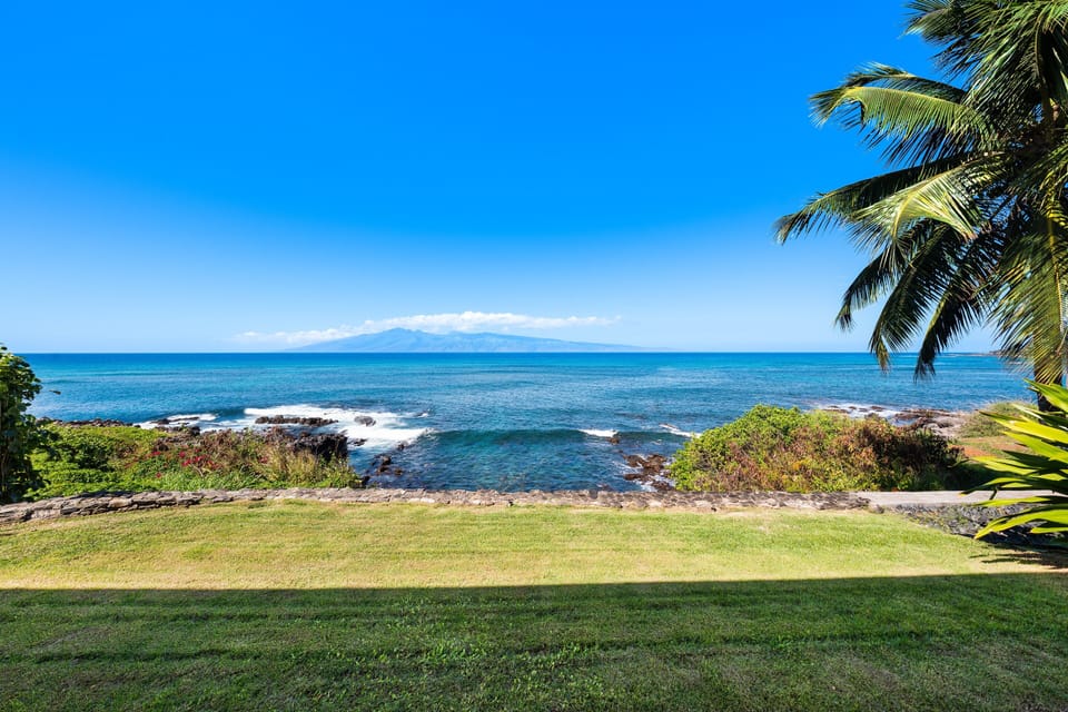 Watch the sunset paint the sky from your private grassy perch by the sea