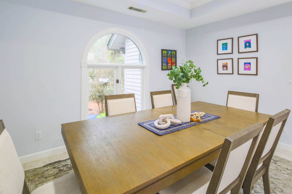 The dining table in the dining room seats 6.