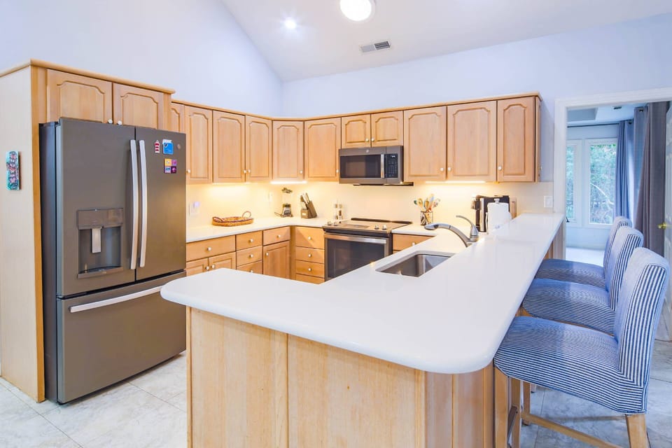 There's plenty of room in the well-stocked, spacious kitchen for your family to prepare their meals.
