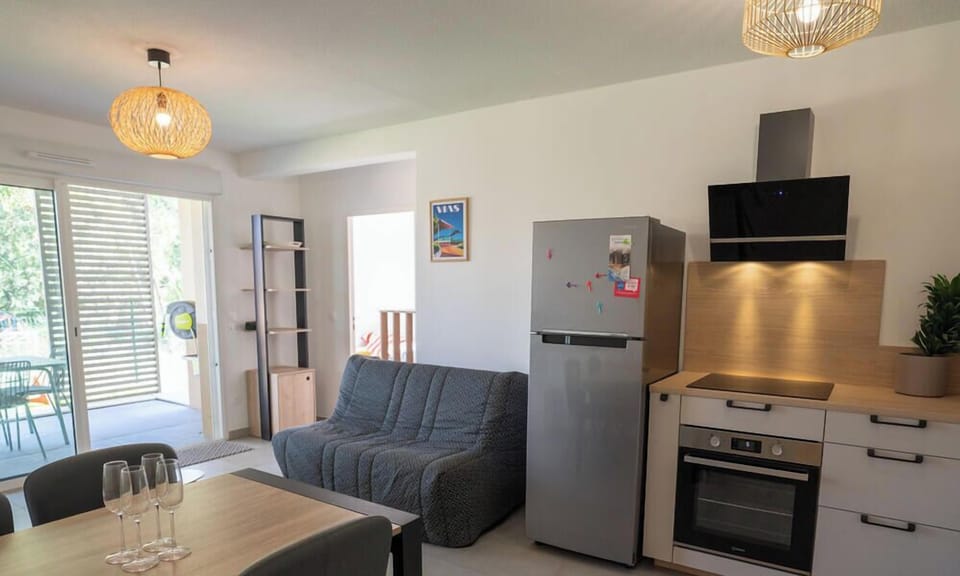 Large air-conditioned living room opening onto the terrace