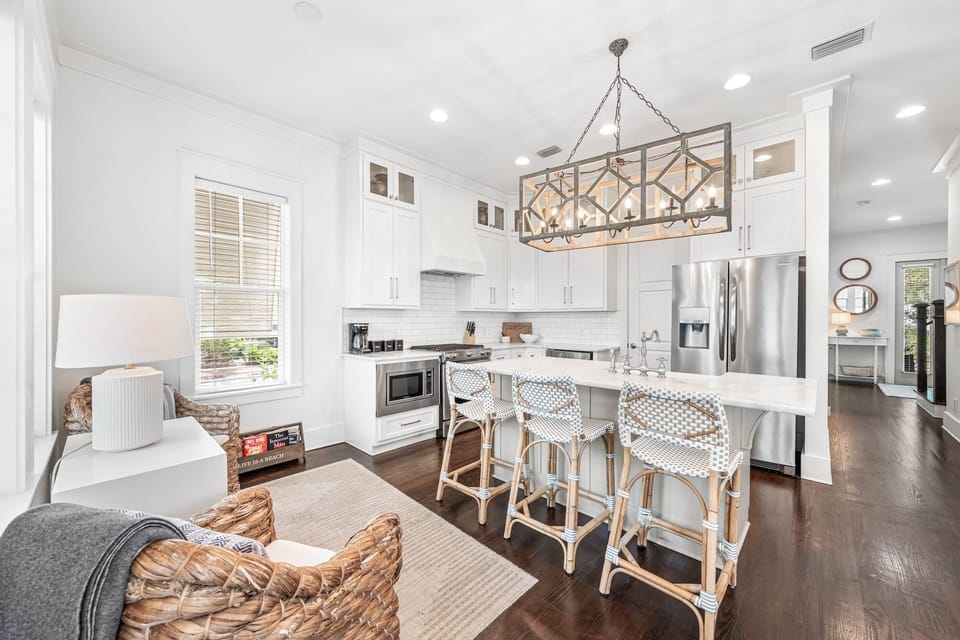 Your bright, open kitchen flows seamlessly into a cozy living space, perfect for morning coffee at the island or unwinding after exploring.