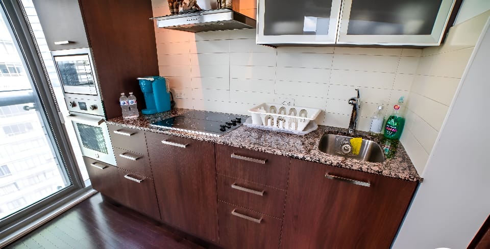 Private Full Kitchen with Full set of appliances, Kettle & Coffee maker