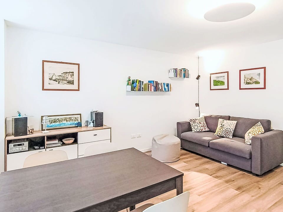 Furniture, Interior Design, Couch, Flooring, Wall, Floor, Room, Living Room, Wood, Ceiling