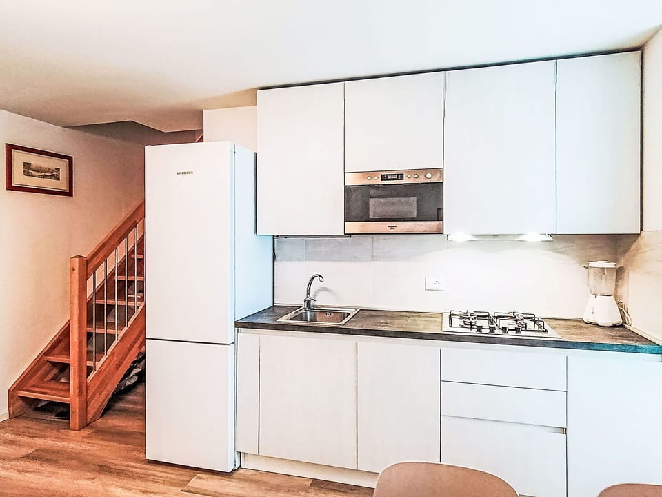 Kitchen, Kitchen Appliance, Flooring, Furniture, Interior Design, Countertop, Wood, Cabinetry, Major Appliance, Floor