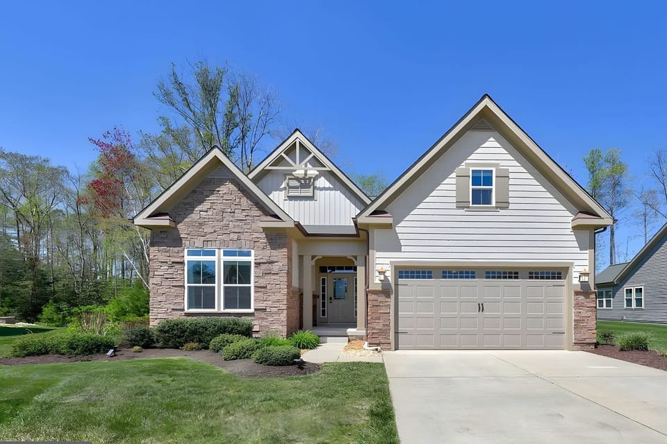 Front of the house with 2 car garage